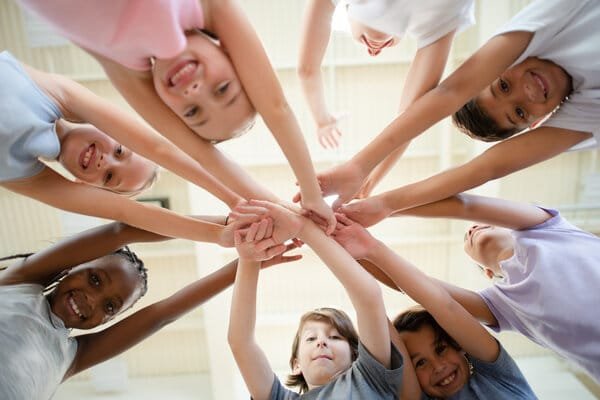 Multi Ethnic Elementary Kids Team Cheer stock photo