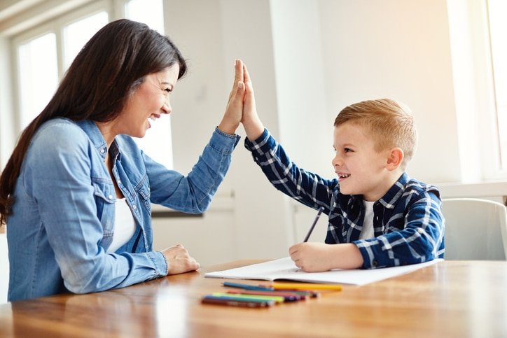homework teaching boy high five education mother children son familiy childhood