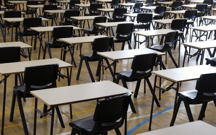 Masses of exam tables set up ready for test